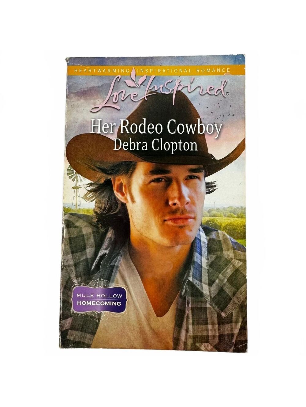 Her Rodeo Cowboy by Debra Clopton (paperback)